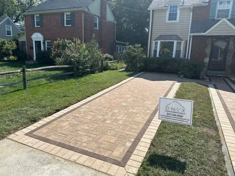 Wide paver driveway with soldier-course edging