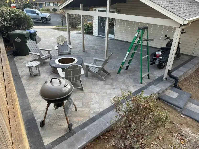 Natural stone patio behind a residential home