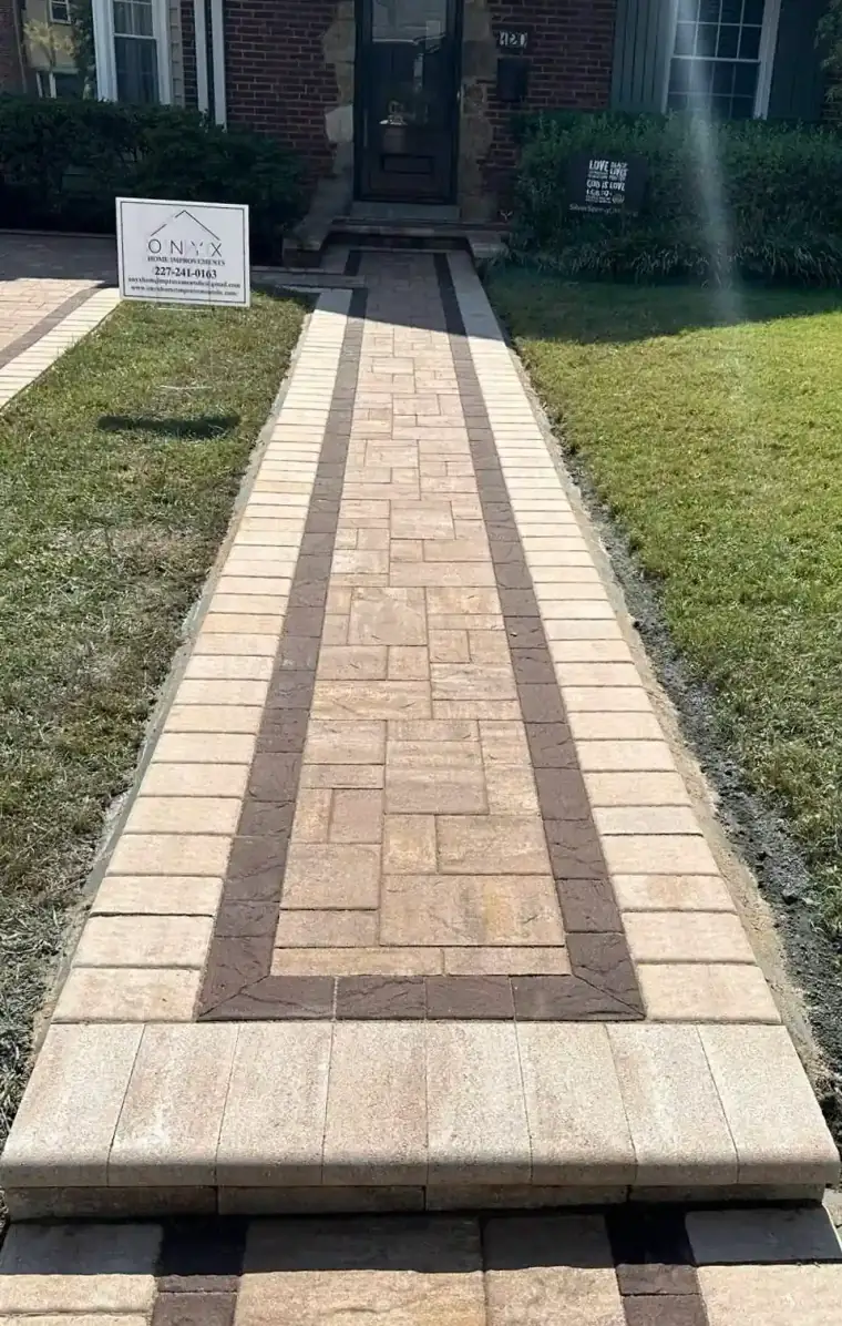 Long paver walkway with a contrasting centre band