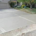 Freshly laid cement driveway.