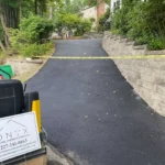 Freshly laid asphalt driveway.