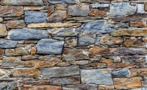 Close-up texture of slate slabs used in natural stone veneer applications.