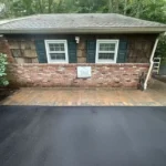 Freshly laid asphalt driveway.