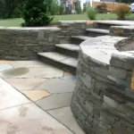 Stone retaining wall and steps.