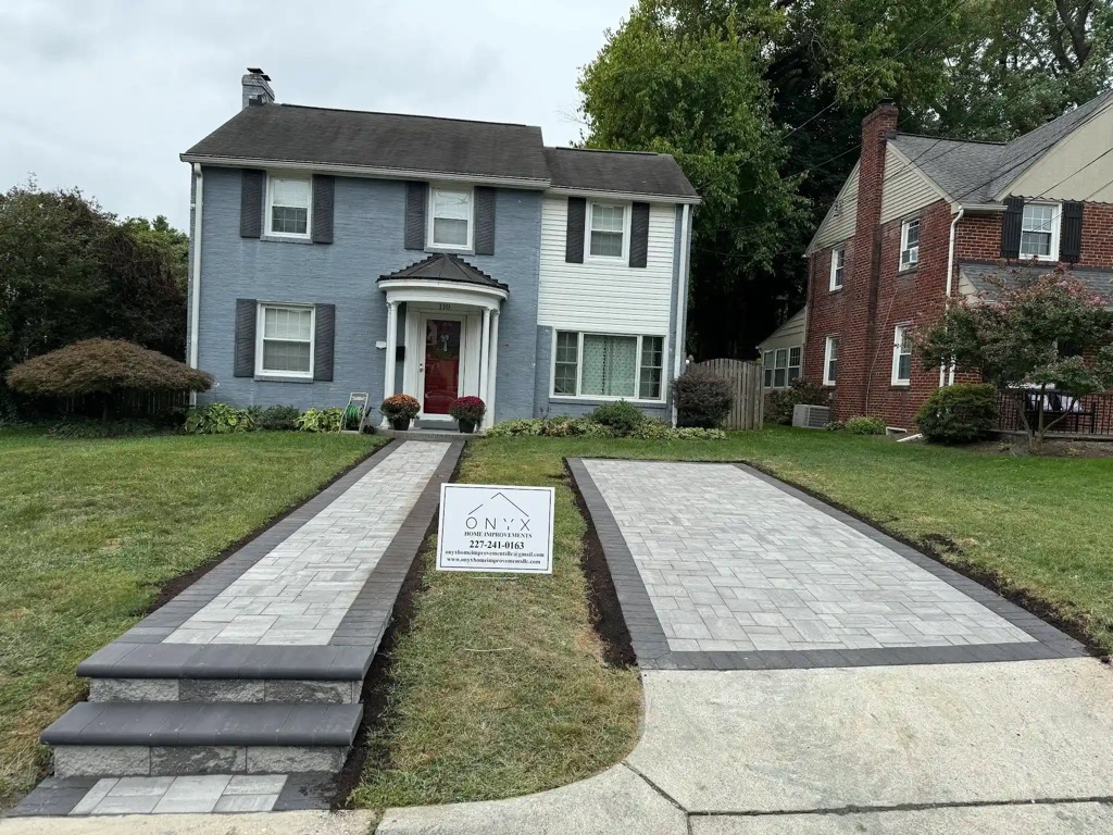 Newly paved concrete walkways with smooth exposed aggregate finish by a local paving company.