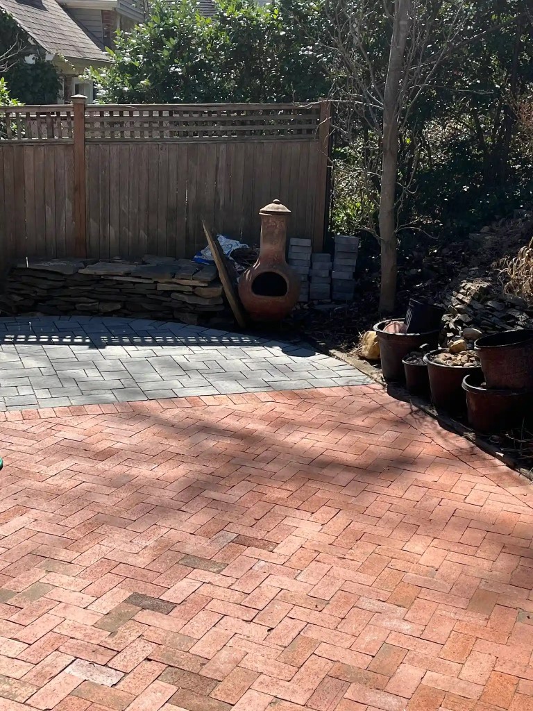 A custom patio paver design in progress.