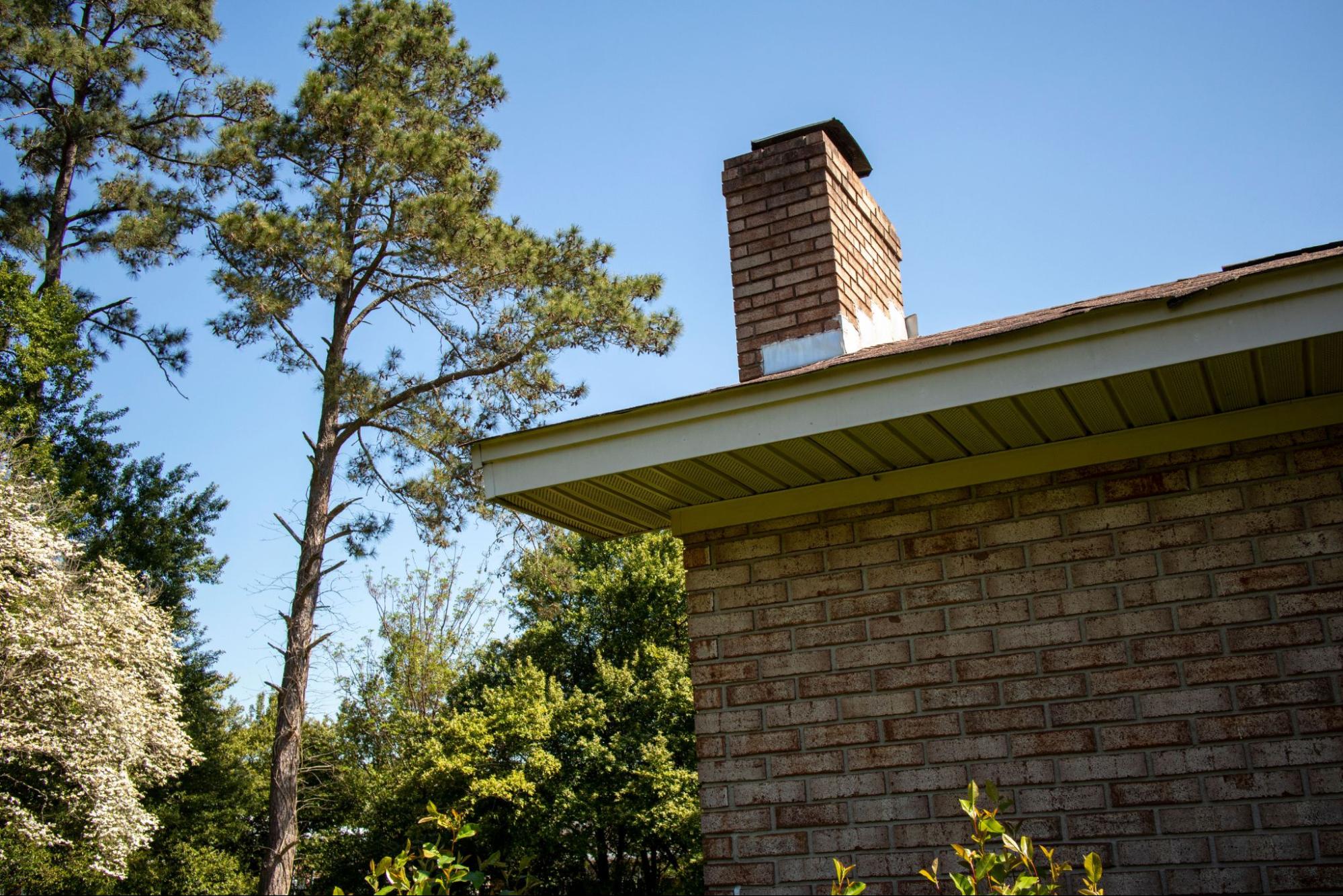 Rooftop chimney on a modern suburban residence