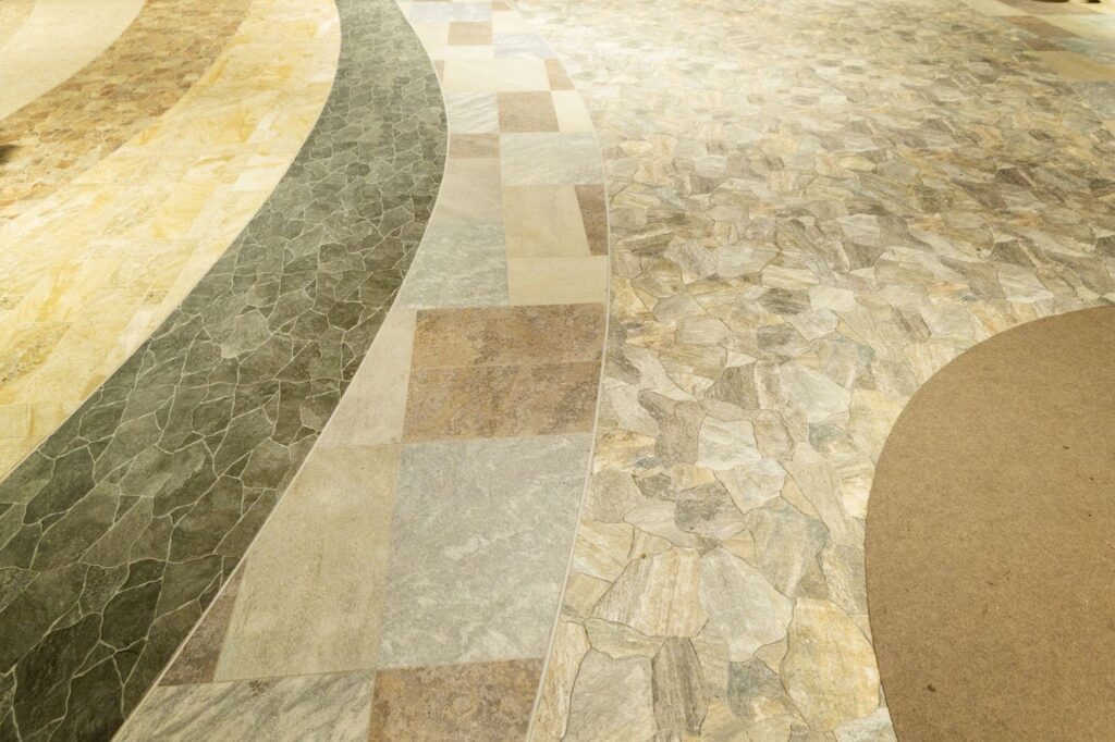 Detailed view of stone flooring pattern with textured surface background.